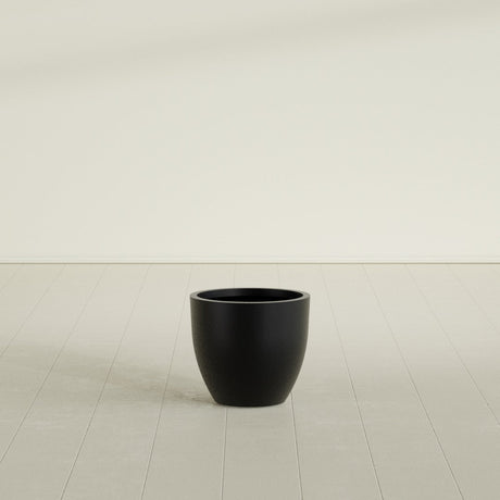 Wannsee Round Planter in Matte Black, 22"D × 19"H, shown empty