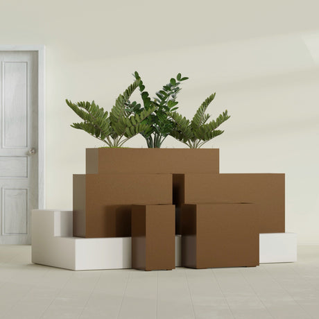 Potsdam Rectangular fiberglass planter in Metallic Bronze, size range, in a sunlit interior