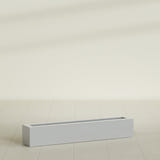 Salon Box Planter in Metallic Silver, 48" Long, shown empty