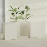 Amesbury Narrow Rectangular fiberglass planter in Satin Beige, size range, in a sunlit interior