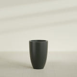 Brannan Tapered Round Planter in Matte Charcoal, 24"D × 35"H, shown empty