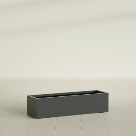 Cuba Low Rectangular Planter in Matte Charcoal, 48"L × 14"D × 12"H, shown empty