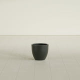 Wannsee Round Planter in Matte Charcoal, 15"D × 13"H, shown empty