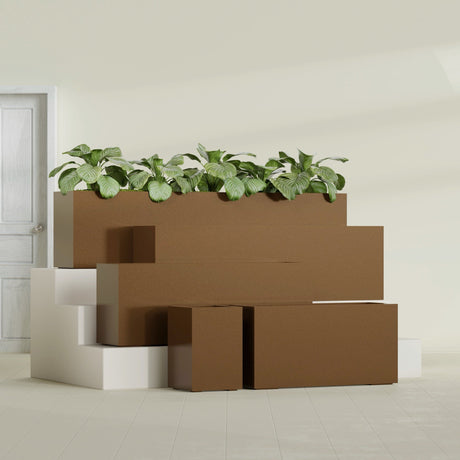 Miami Corner fiberglass planter in Metallic Bronze, size range, in a sunlit interior
