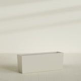 Panama Tapered Rectangular Planter in Satin Beige, 48"L × 12"D × 18"H, shown empty