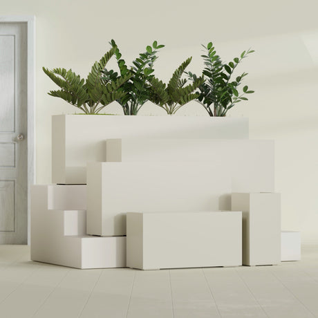 Hollywood Corner fiberglass planter in Satin Beige, size range, in a sunlit interior
