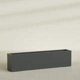 Miami Narrow Rectangular Planter in Matte Charcoal, 72"L × 12"D × 18"H, shown empty