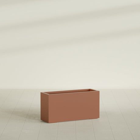 Hollywood Narrow Rectangular Planter in Matte Terra Cotta, 36"L × 12"D × 24"H, shown empty