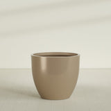 Wannsee Round Planter in Gloss Metallic Gold, 50"D × 44"H, shown empty