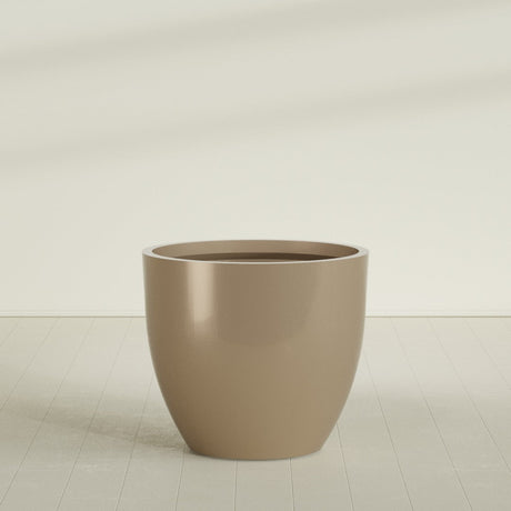 Wannsee Round Planter in Gloss Metallic Gold, 50"D × 44"H, shown empty