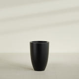 Brannan Tapered Round Planter in Matte Black, 24"D × 35"H, shown empty
