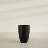 Brannan Tapered Round Planter in Matte Black, 24"D × 35"H, shown empty