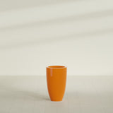 Brannan Tapered Round Planter in Gloss Tangerine, 18"D × 29"H, shown empty