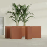 Perth Rectangular fiberglass planter in Matte Terra Cotta, size range, in a sunlit interior