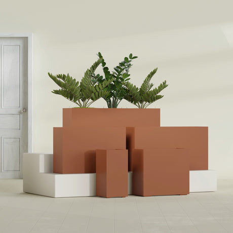 Potsdam Rectangular fiberglass planter in Matte Terra Cotta, size range, in a sunlit interior