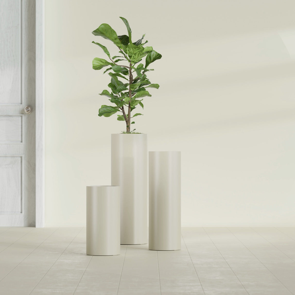Corry Cylinder fiberglass planter in Satin Beige, size range, in a sunlit interior