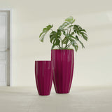 San Jose Tall Fluted fiberglass planter in Gloss Eggplant, size range, in a sunlit interior