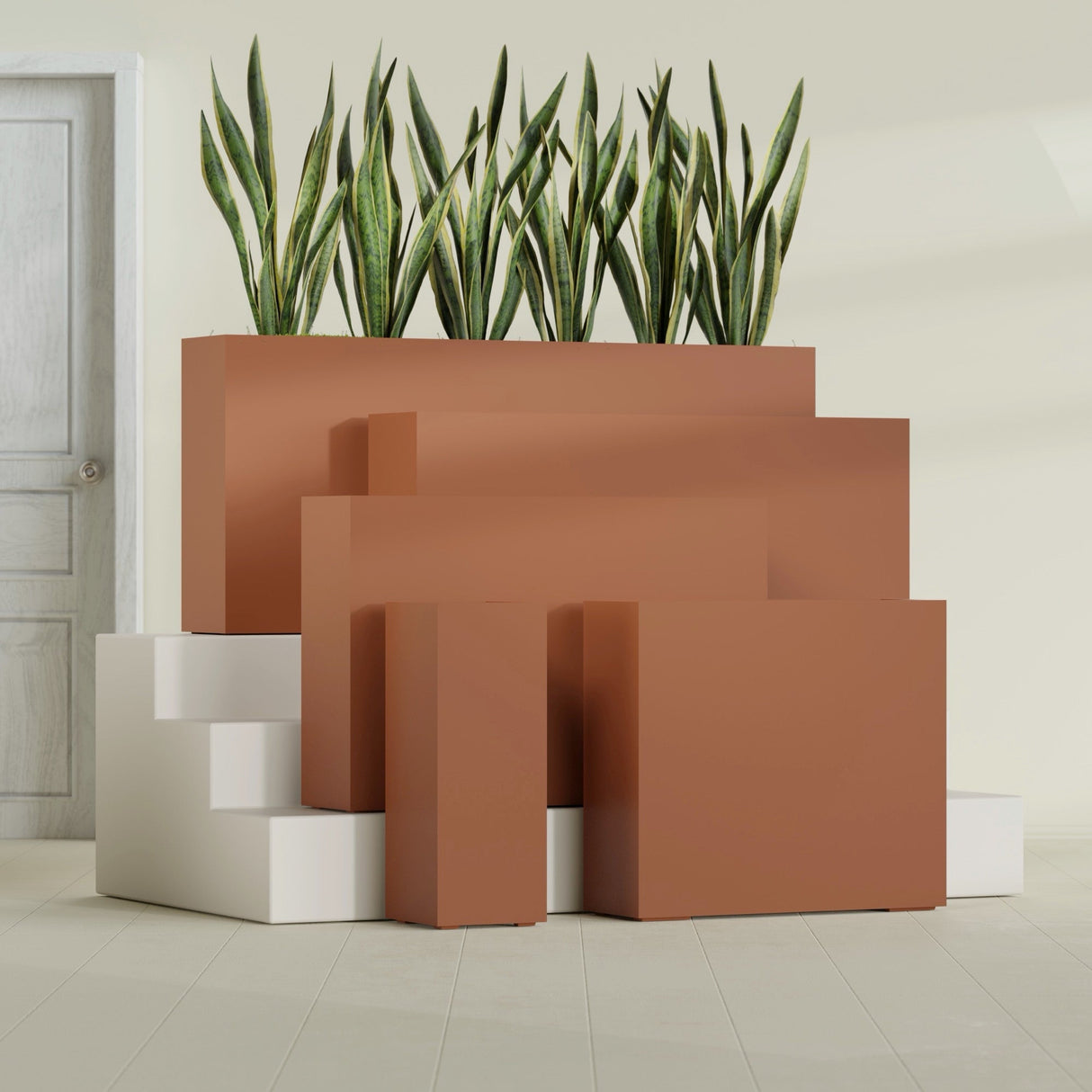 Delray Corner fiberglass planter in Matte Terra Cotta, size range, in a sunlit interior