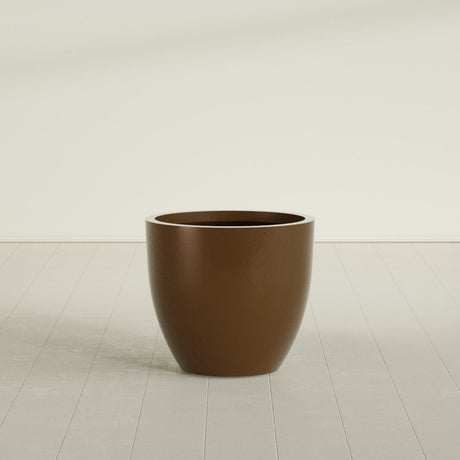 Wannsee Round Planter in Metallic Bronze, 33"D × 29"H, shown empty