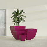 Lima Tapered Square fiberglass planter in Gloss Eggplant, size range, in a sunlit interior