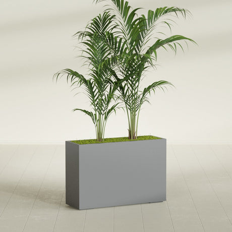 Potsdam Rectangular fiberglass planter in Matte Gunmetal, shown planted, in a sunlit interior