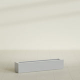 Salon Box Planter in Metallic Silver, 42" Long, shown empty