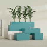 Torino Wide Rectangular fiberglass planter in Satin Seafoam Green, size range, in a sunlit interior