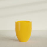 Valencia Tapered Round Planter in Gloss Saffron, 27"D × 31"H, shown empty
