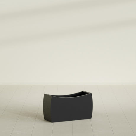 Seoul Curved Planter in Matte Black, 32"L × 12"D × 18"H, shown empty