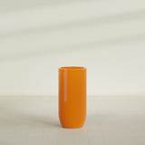 Saint Tropez Bullet Round Planter in Gloss Tangerine, 24"D × 50"H, shown empty