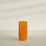 Saint Tropez Bullet Round Planter in Gloss Tangerine, 24"D × 50"H, shown empty