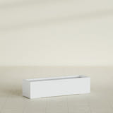 Cuba Low Rectangular Planter in Gloss Bright White, 48"L × 14"D × 12"H, shown empty