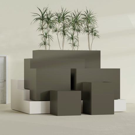 Brisbane Corner fiberglass planter in Matte Bronze, size range, in a sunlit interior