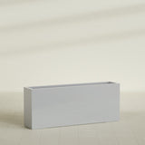 Hollywood Narrow Rectangular Planter in Metallic Silver, 60"L × 12"D × 24"H, shown empty