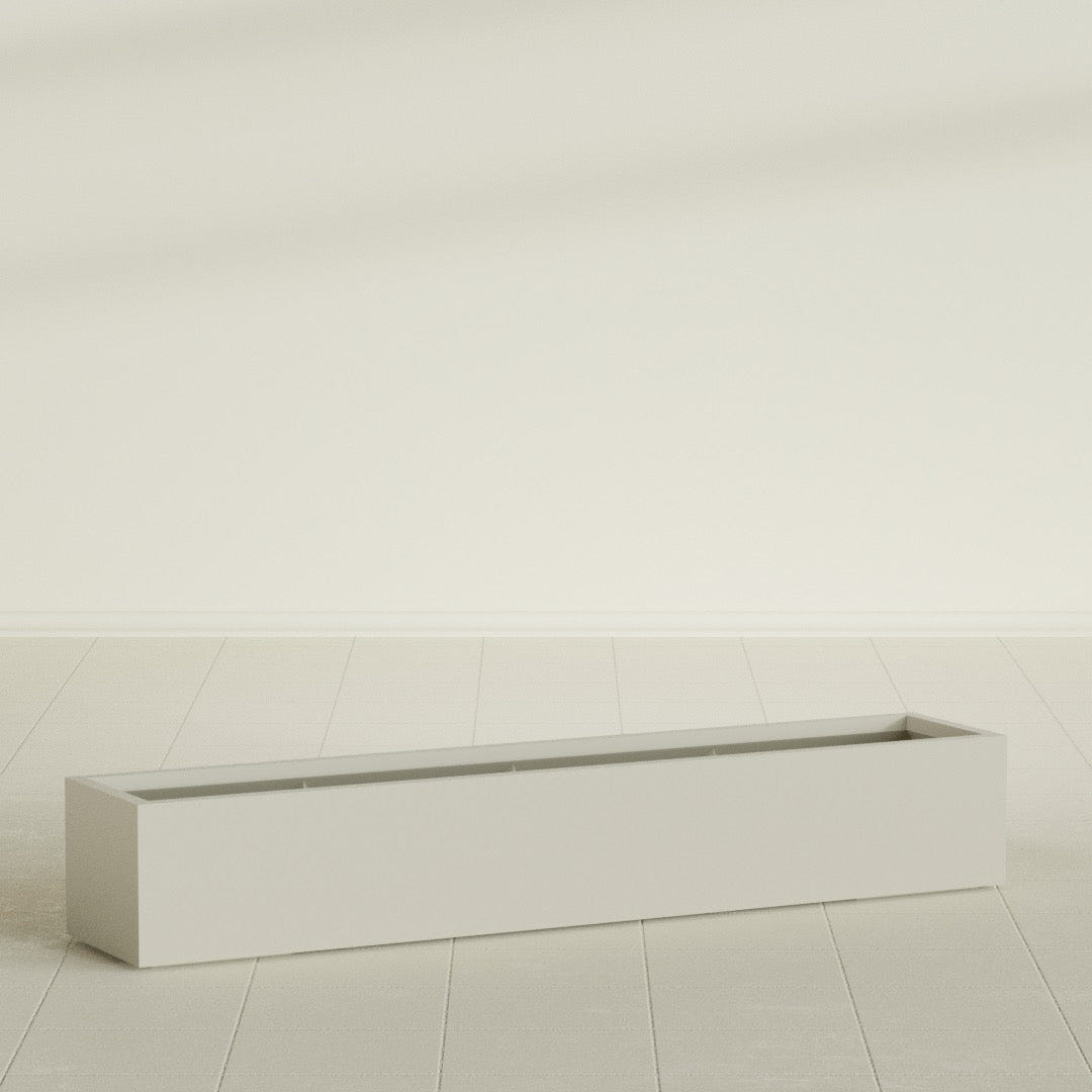 Cuba Low Rectangular Planter in Satin Beige, 72"L × 14"D × 12"H, shown empty