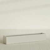 Cuba Low Rectangular Planter in Satin Beige, 72"L × 14"D × 12"H, shown empty