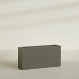 Hollywood Narrow Rectangular Planter in Matte Bronze, 48"L × 12"D × 24"H, shown empty