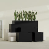 Granada rectangular fiberglass planter in Matte Black, all four lengths shown together, 36 to 72 in long