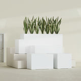 Granada rectangular fiberglass planter in Matte Bright White, all four lengths shown together, 36 to 72 in long