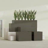 Granada rectangular fiberglass planter in Matte Bronze, all four lengths shown together, 36 to 72 in long
