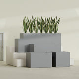Granada rectangular fiberglass planter in Matte Gunmetal, all four lengths shown together, 36 to 72 in long