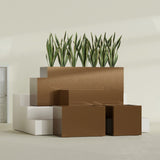 Granada rectangular fiberglass planter in Metallic Bronze, all four lengths shown together, 36 to 72 in long