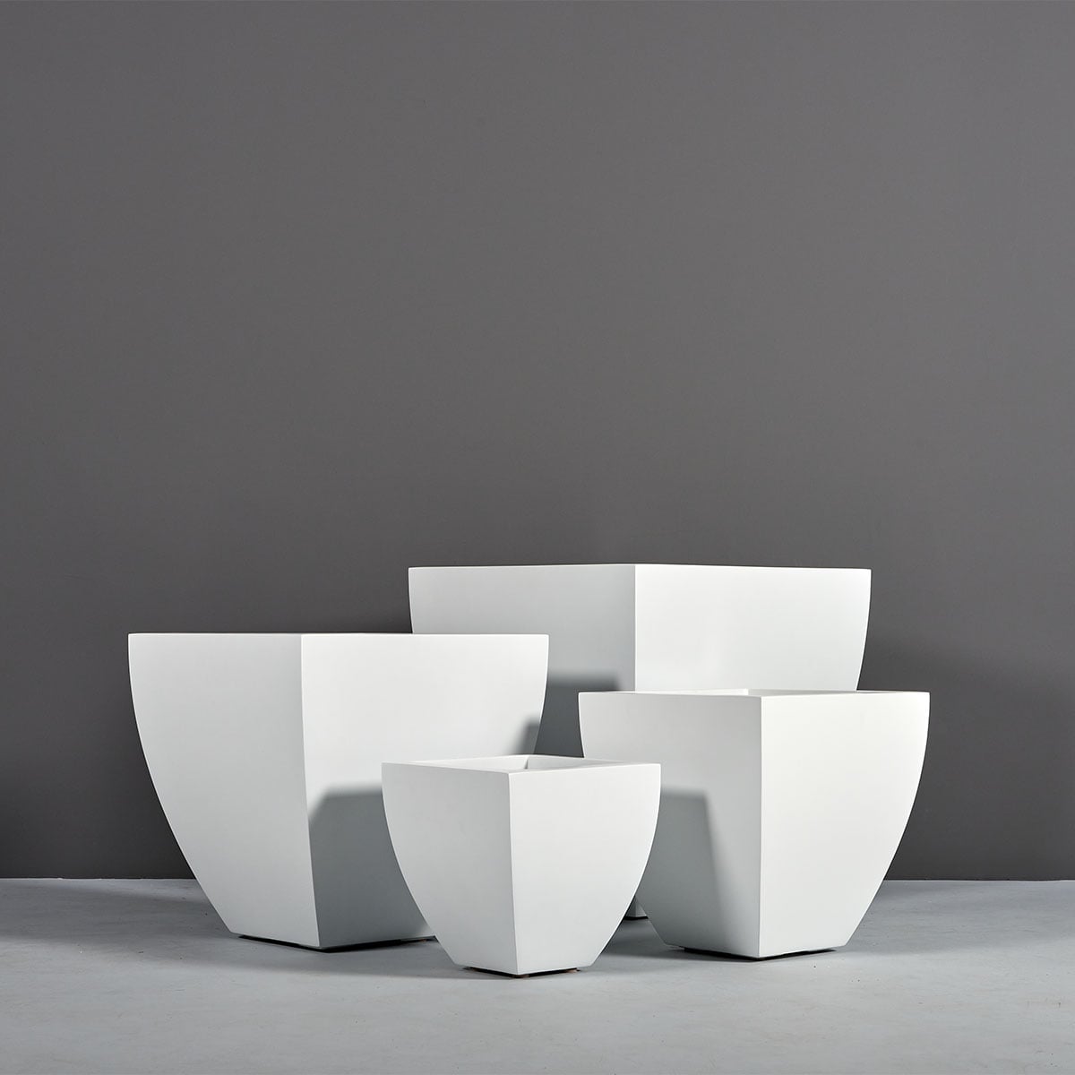 Lima tapered square fiberglass planter, the full size range grouped together