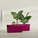 Panama tapered fiberglass planter in Gloss Eggplant, 36"L × 12"D × 18"H, shown empty