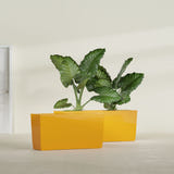 Panama tapered fiberglass planter in Gloss Saffron, 36"L × 12"D × 18"H, shown empty