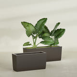 Panama tapered fiberglass planter in Matte Black, 36"L × 12"D × 18"H, shown empty