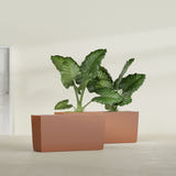 Panama tapered fiberglass planter in Matte Terra Cotta, 36"L × 12"D × 18"H, shown empty