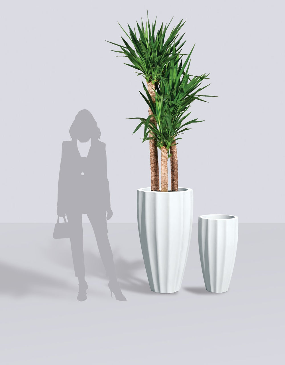 San Jose Tall Fluted fiberglass planter size range shown to scale beside a standing figure