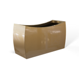 Seoul curved fiberglass planter in Gloss Metallic Gold, 32 × 12 × 18 in, studio render