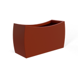 Seoul curved fiberglass planter in Matte Terra Cotta, 32 × 12 × 18 in, studio render